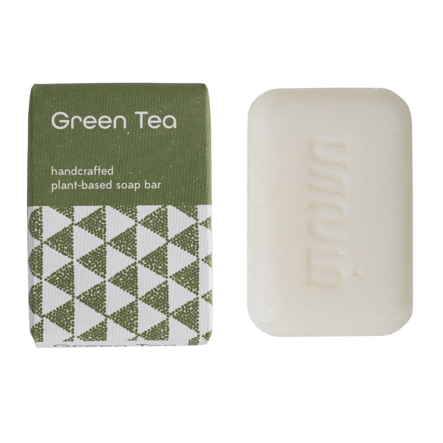 Close-up of handmade green tea soap with natural ingredients for glowing skin
