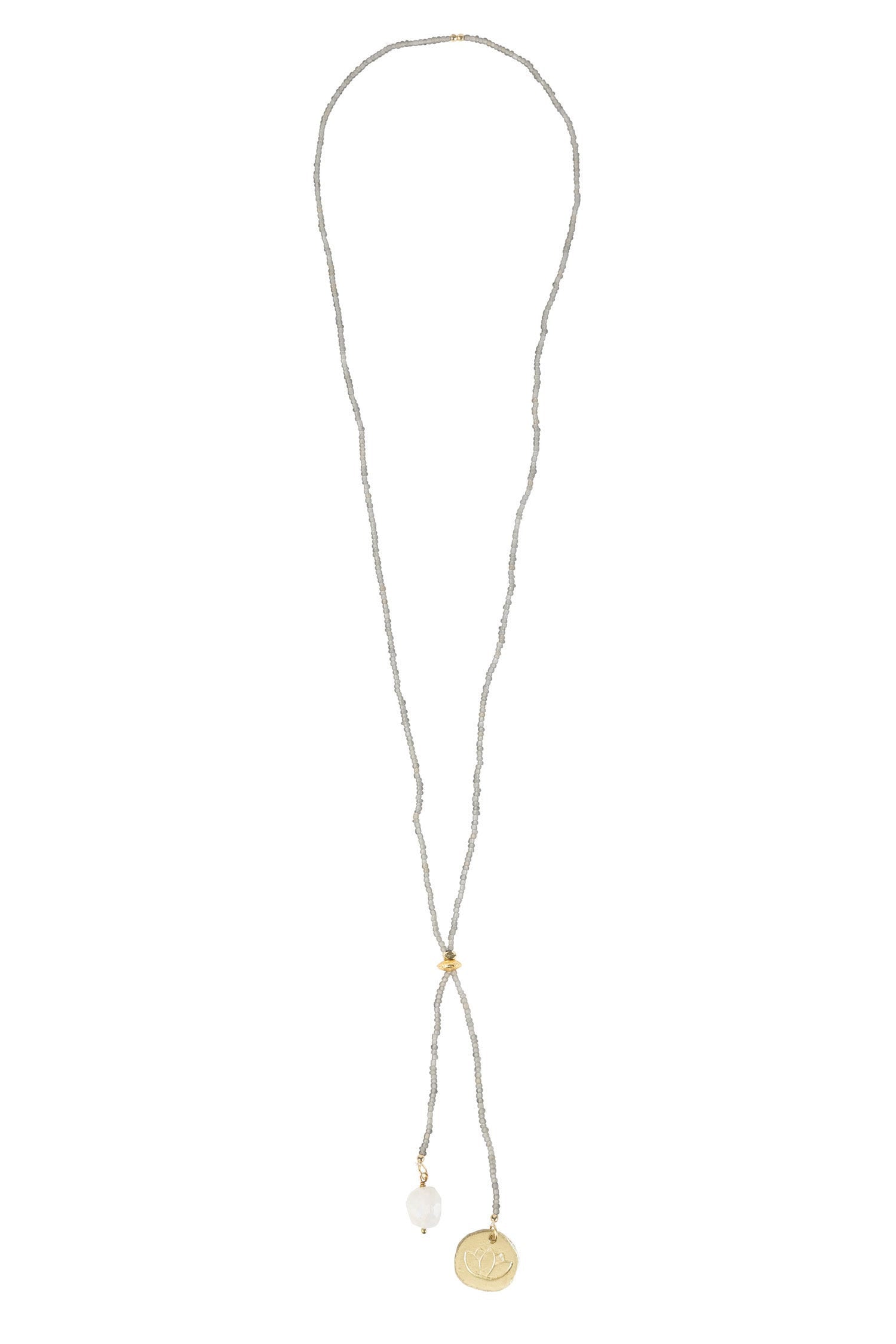 Close-up of the Celestial Charm Gold Lariat Necklace featuring a white moonstone and lotus coin charm.
