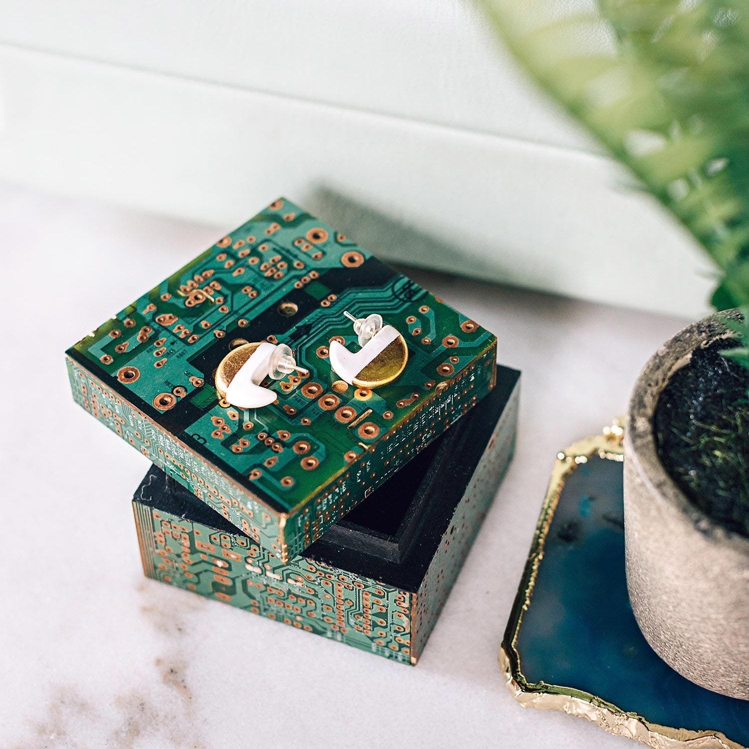 Artisan crafted keepsake box showcasing intricate details from repurposed computer parts.