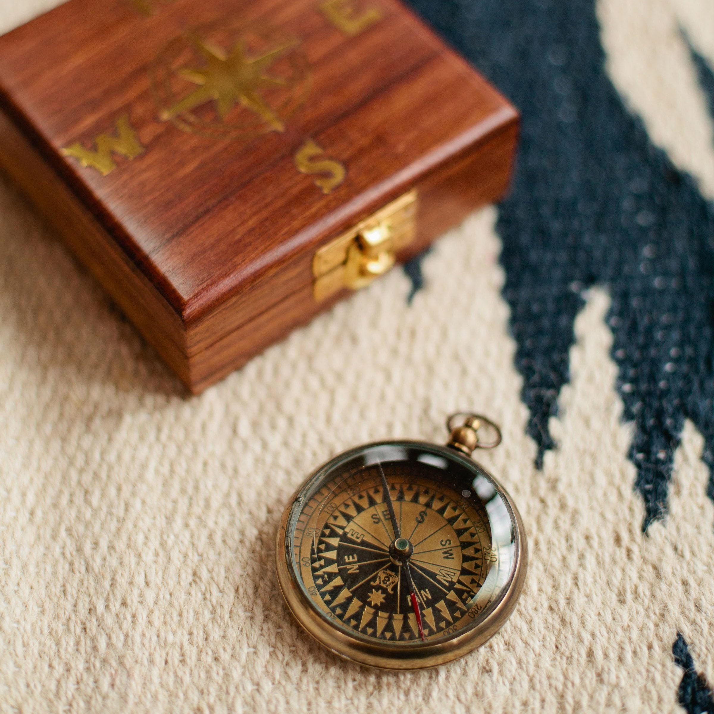 Sheesham wood compass with engraved design for outdoor adventures