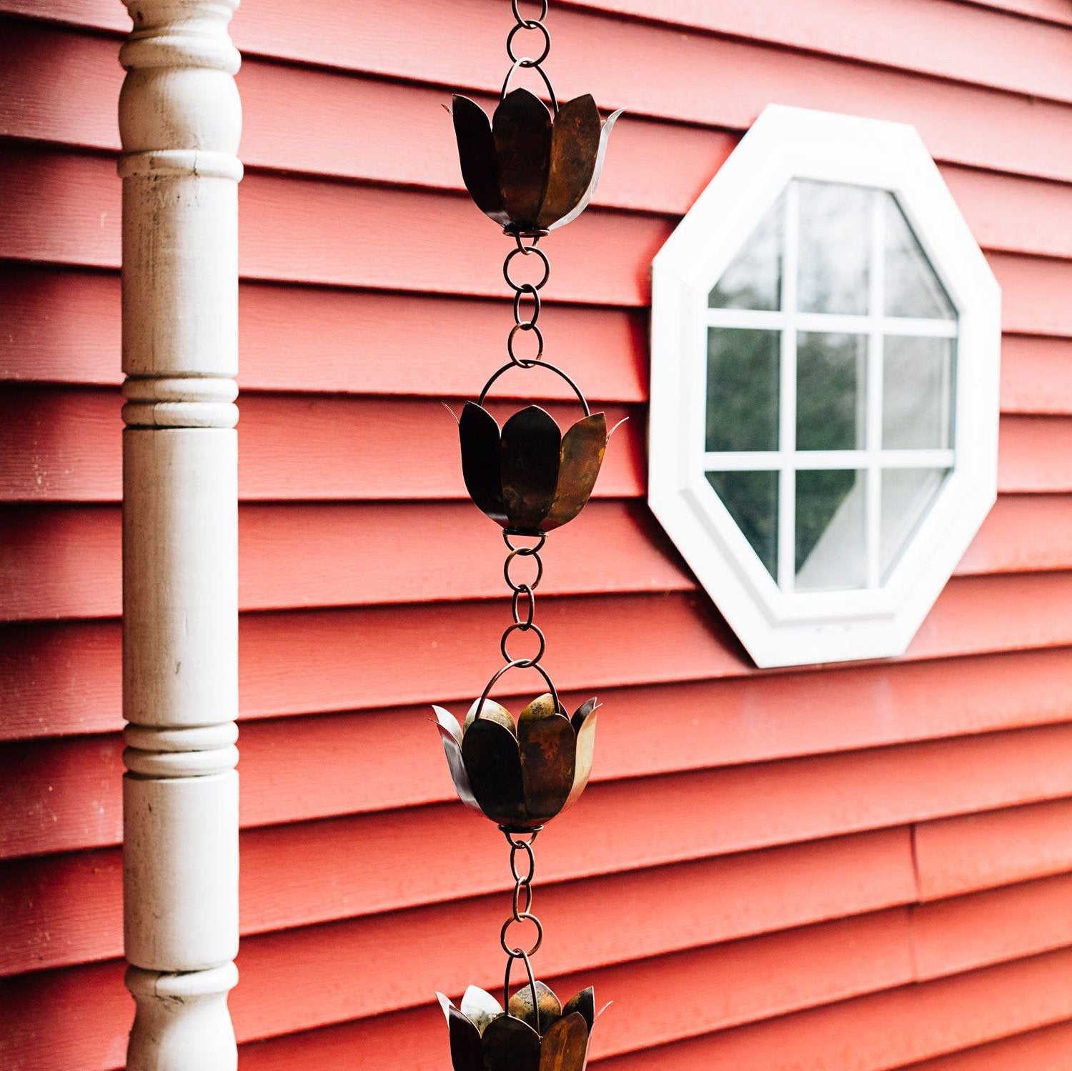 Close-up of the Elegant Lotus Rain Chain displaying its intricate craftsmanship and unique design.