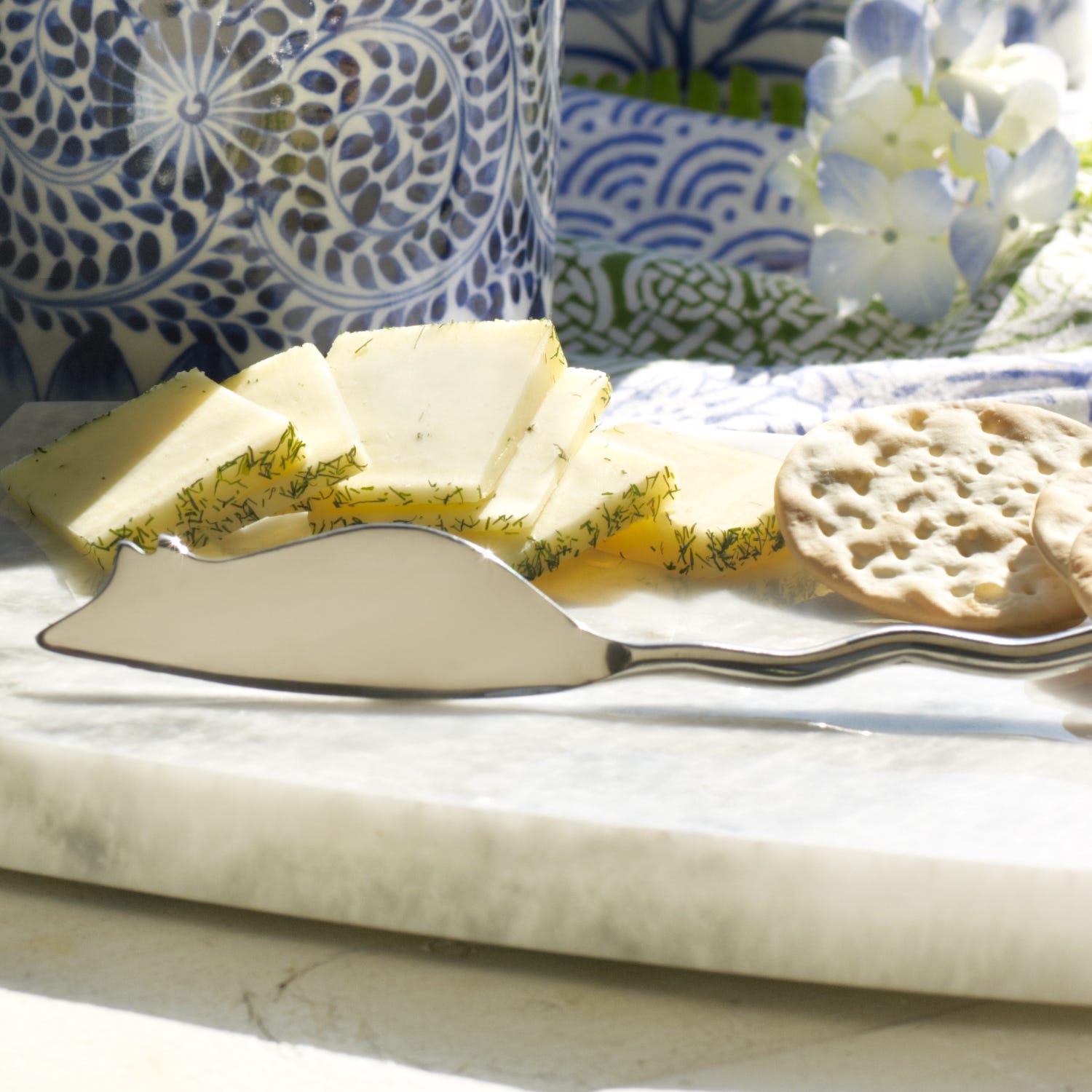 Whimsical mouse cheese knife showcasing its playful design and stainless steel blade.
