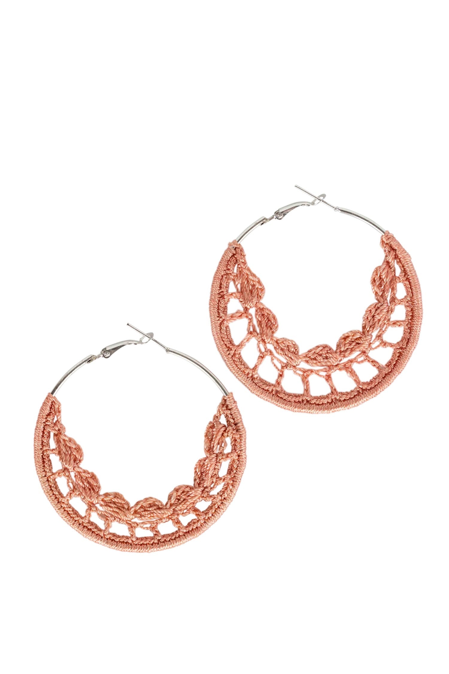 Handcrafted crochet hoop earrings with intricate patterns, perfect for bohemian fashion