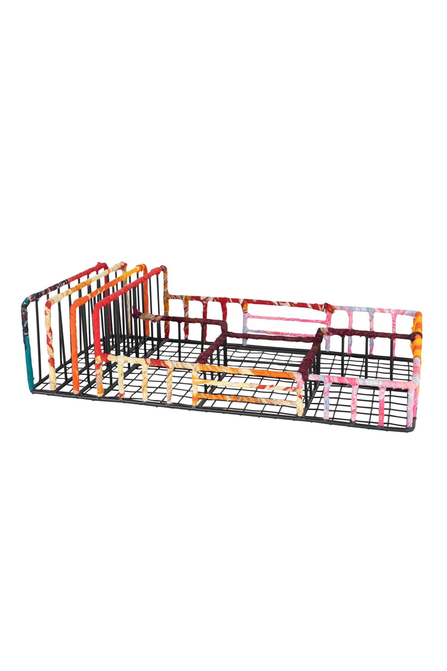 Close-up of colorful sari wrapped desk organizer with multiple compartments