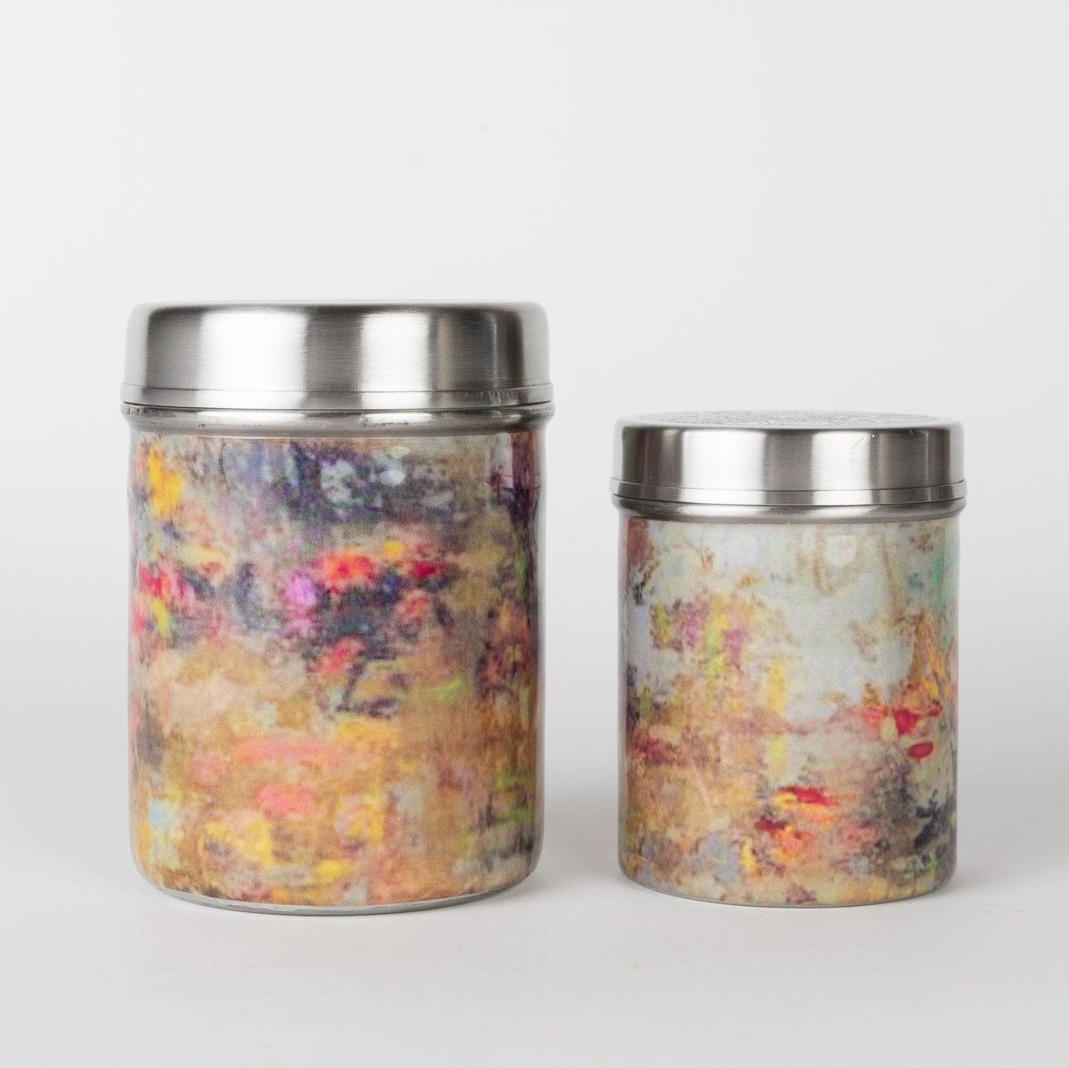 Side view of artisan handcrafted metal storage canister showcasing its etched mandala design.