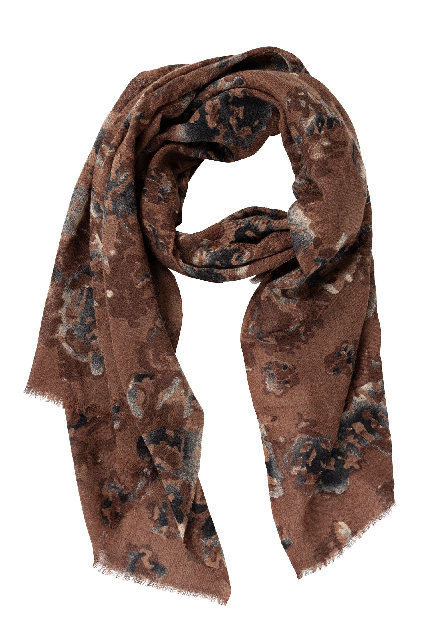 Rustic Floral Watercolor Shawl draped elegantly over a chair, highlighting its floral design.