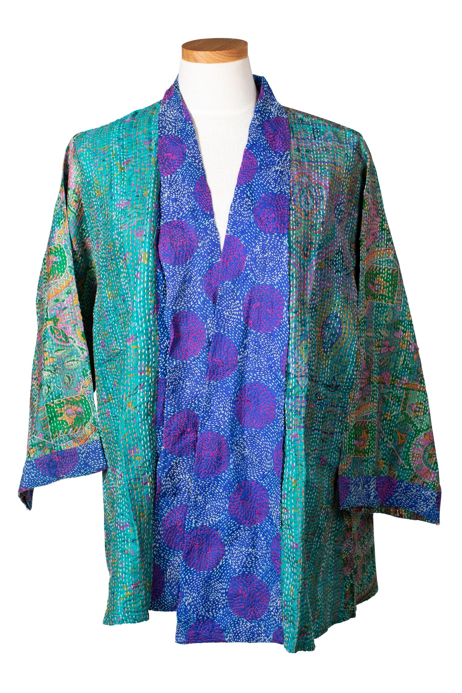 Front view of the eco-friendly sari swing top, highlighting its vibrant colors and A-line silhouette.