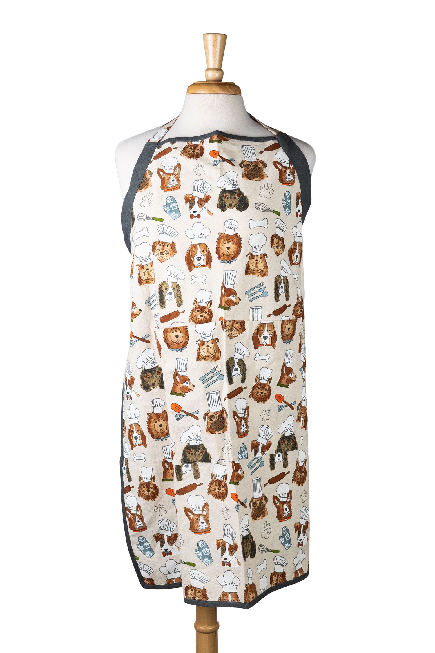 Front view of dog chef apron showing playful dog print and large center pocket