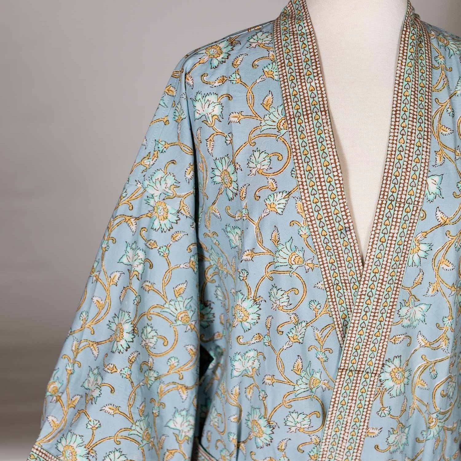 Close-up of the floral pattern on the soft cotton bathrobe