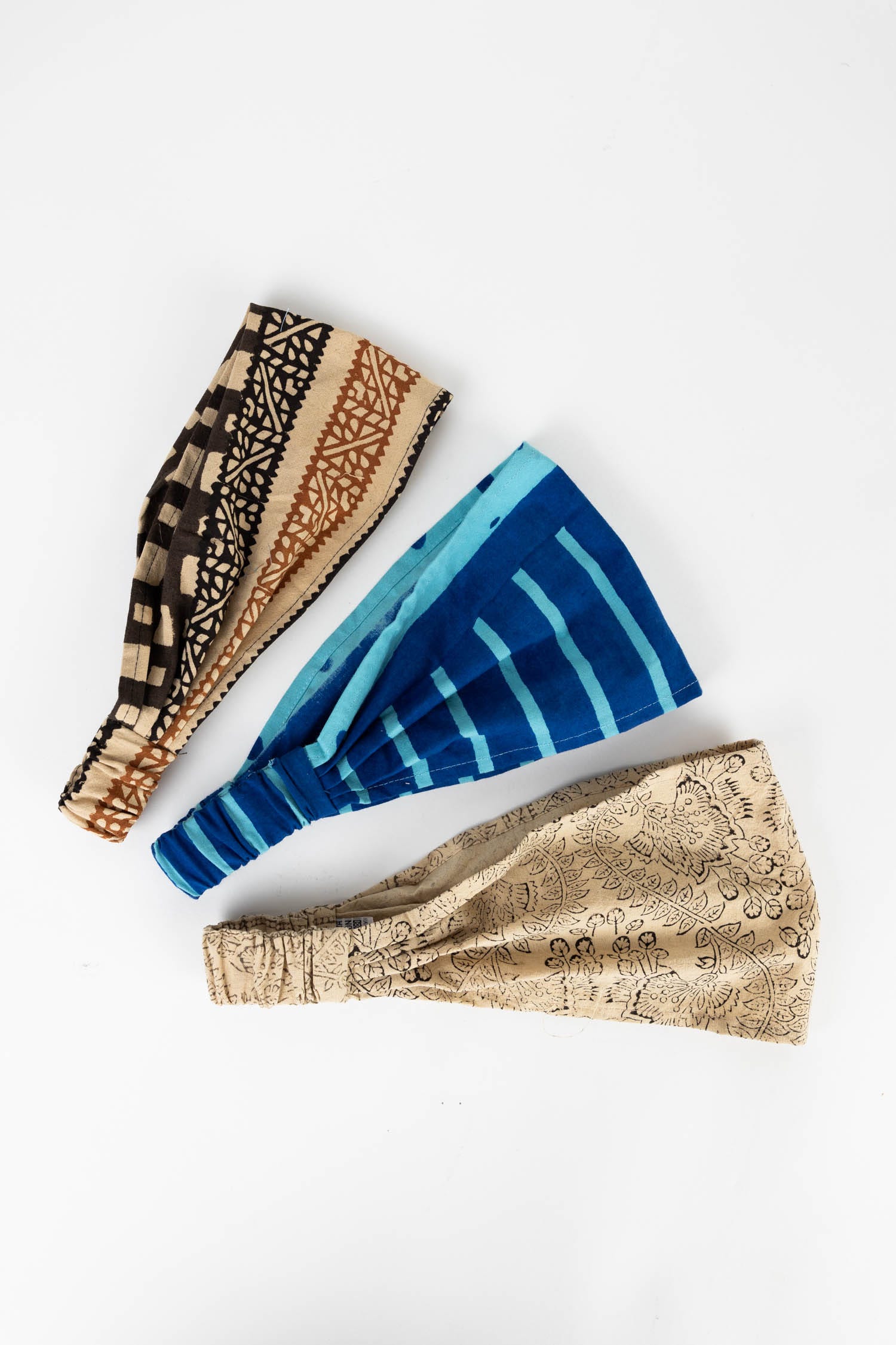Eco-friendly fashion headband showcasing unique block printed design and elastic fit.