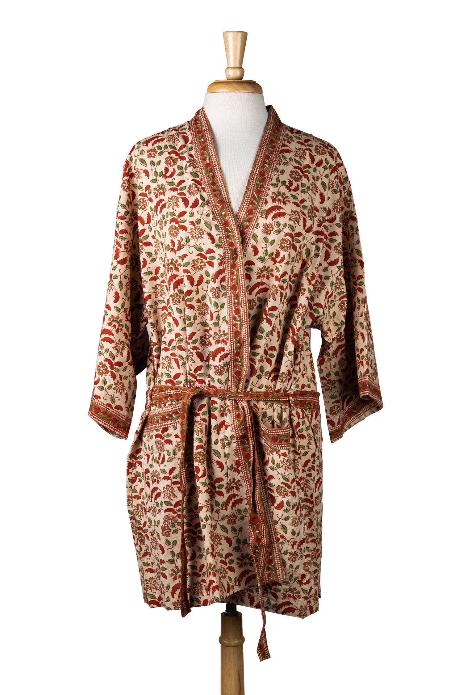 Close-up of floral printed women's robe with pockets and belt for lounging
