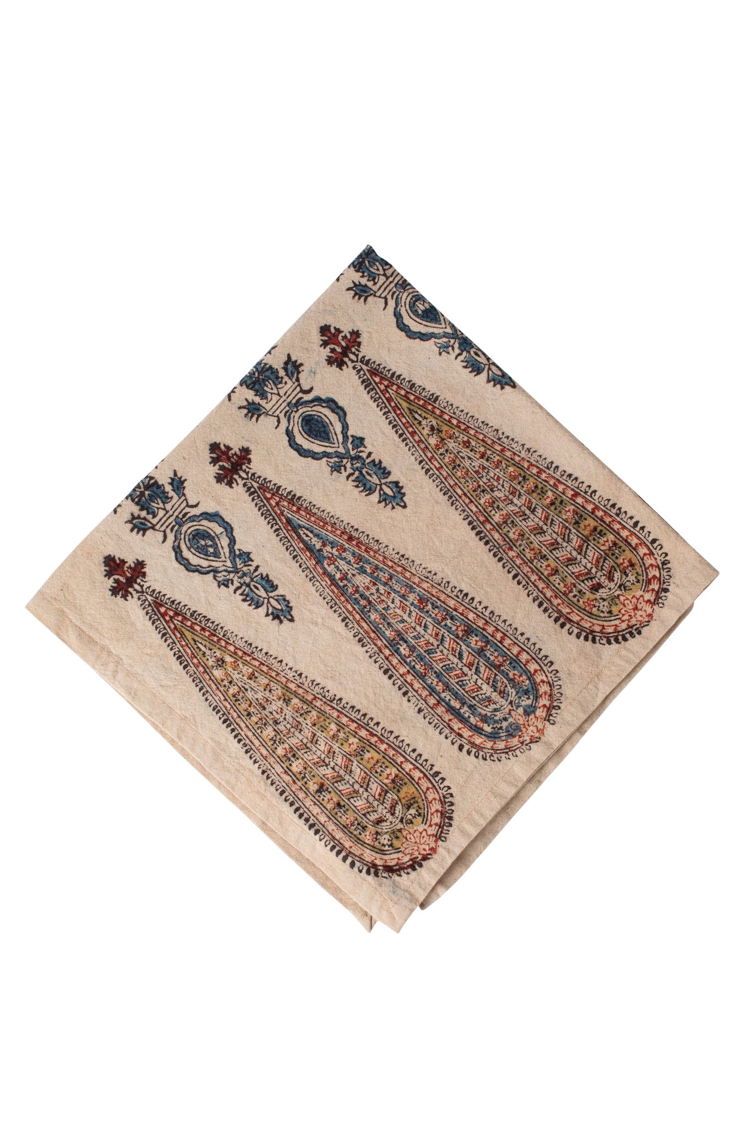 Cypress tree hand block printed cotton napkin on a dining table, showcasing its intricate design.