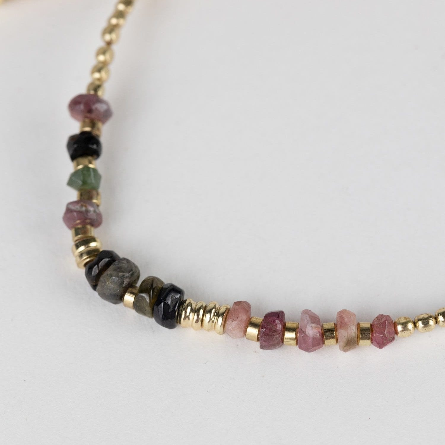 Elegant handmade tourmaline bracelet showcasing natural gemstones and artisan craftsmanship