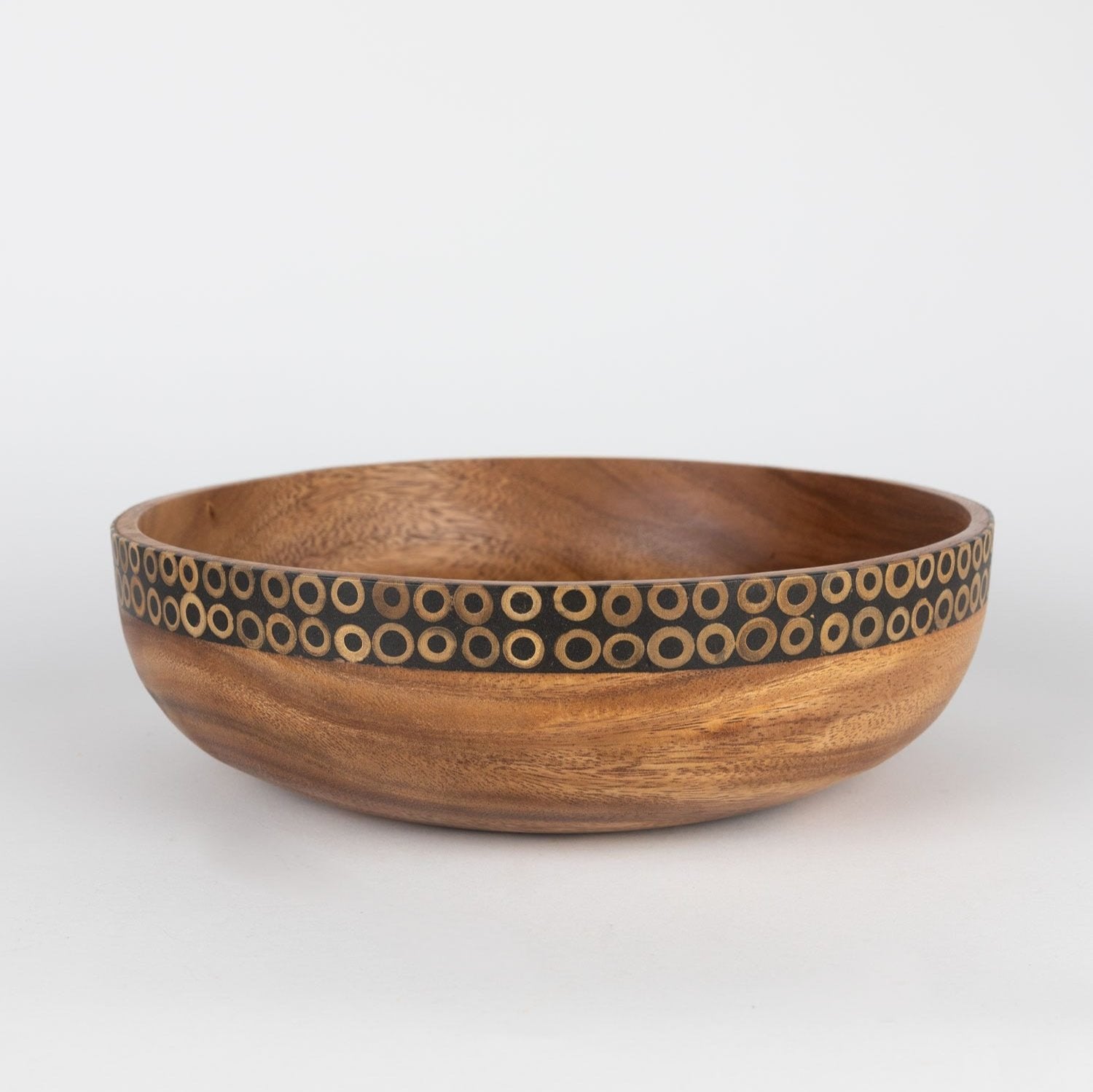 Elegant eco-friendly serving bowl with bamboo inlay, perfect for dinner parties.