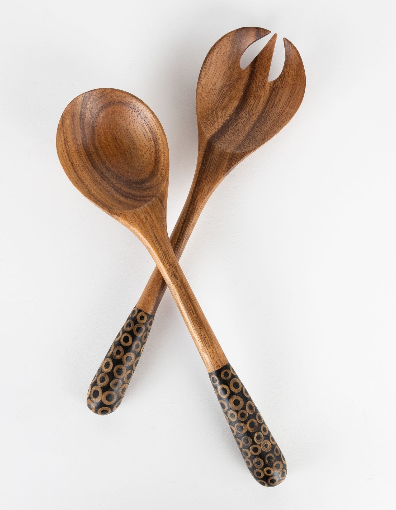 Elegant handcrafted salad servers showcasing natural wood grain and bamboo inlay.