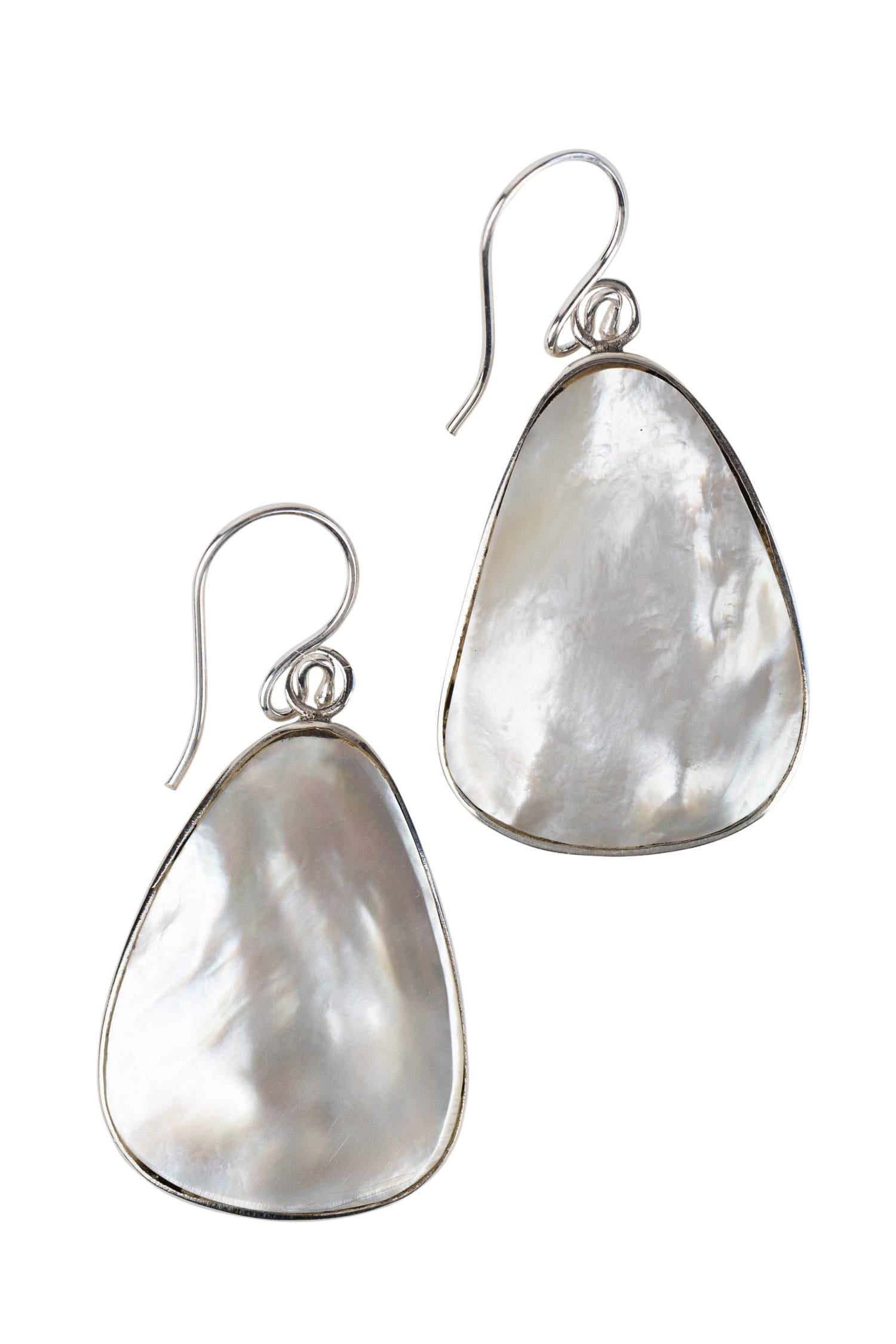 Close-up of mother of pearl drop earrings highlighting their shine and craftsmanship