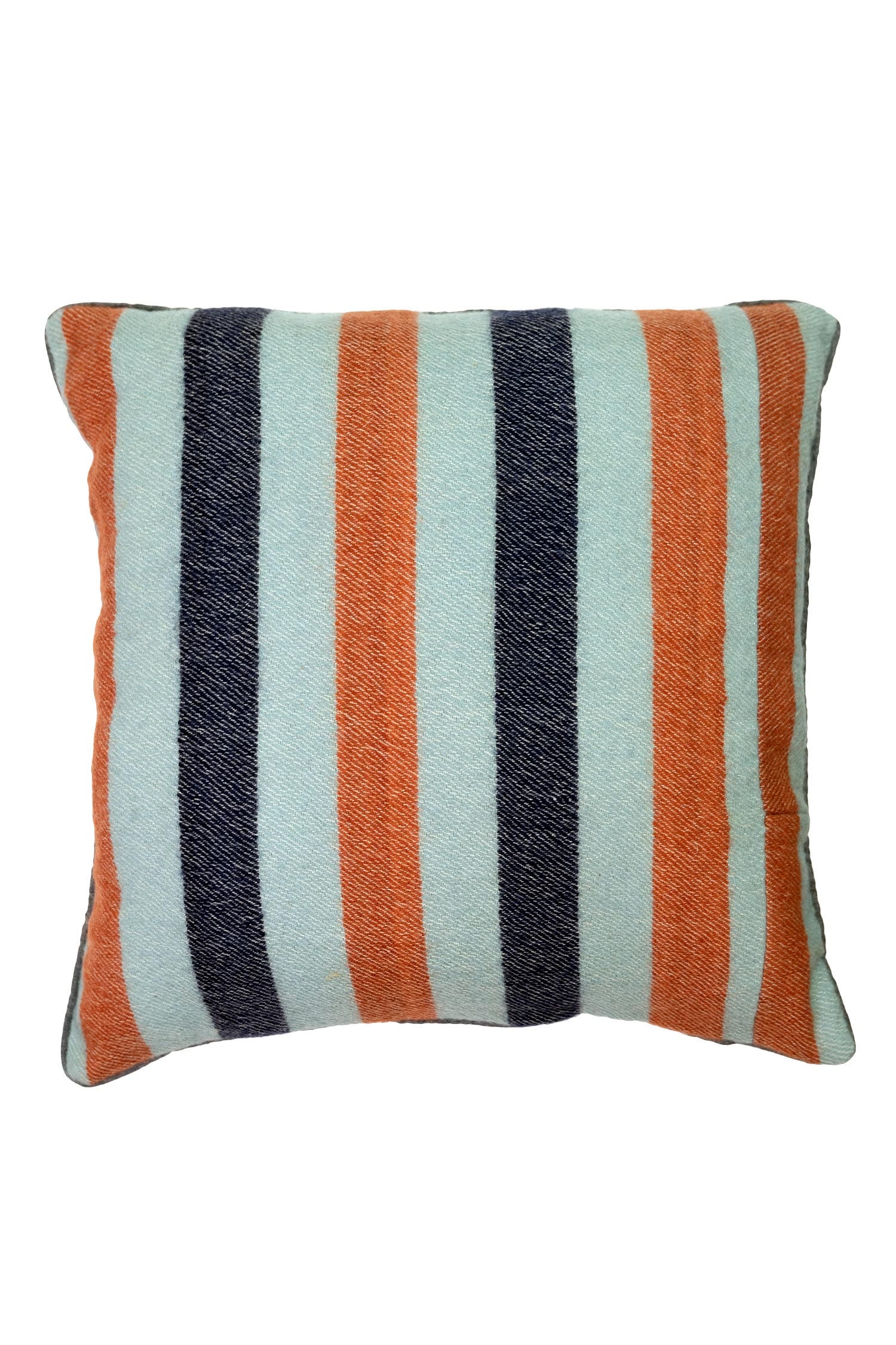 Artisan Elegance Handwoven Pillow on a cozy sofa, highlighting its beautiful stripes.