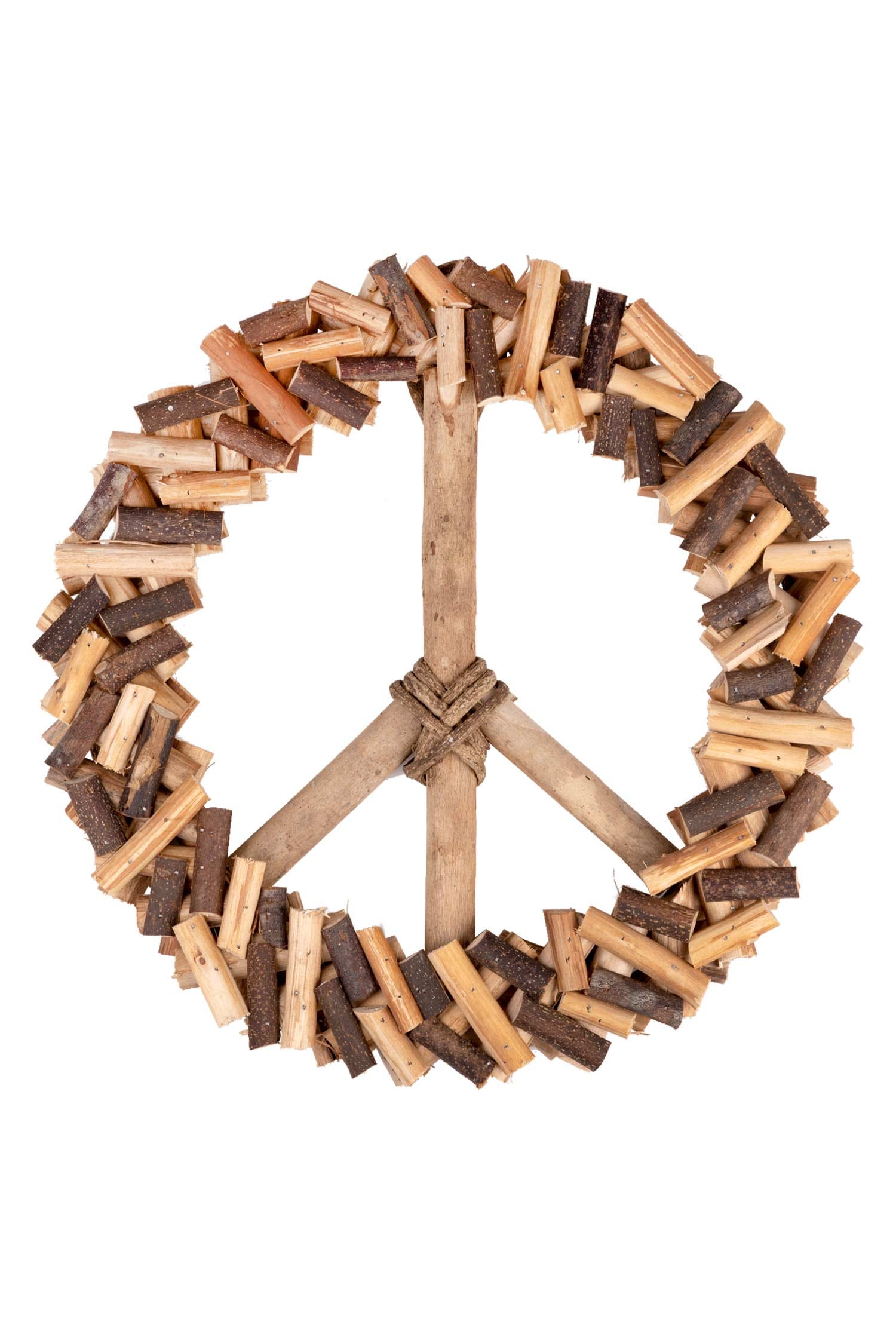 Artisan crafted peace wreath hung on a front door, showcasing its intricate design.