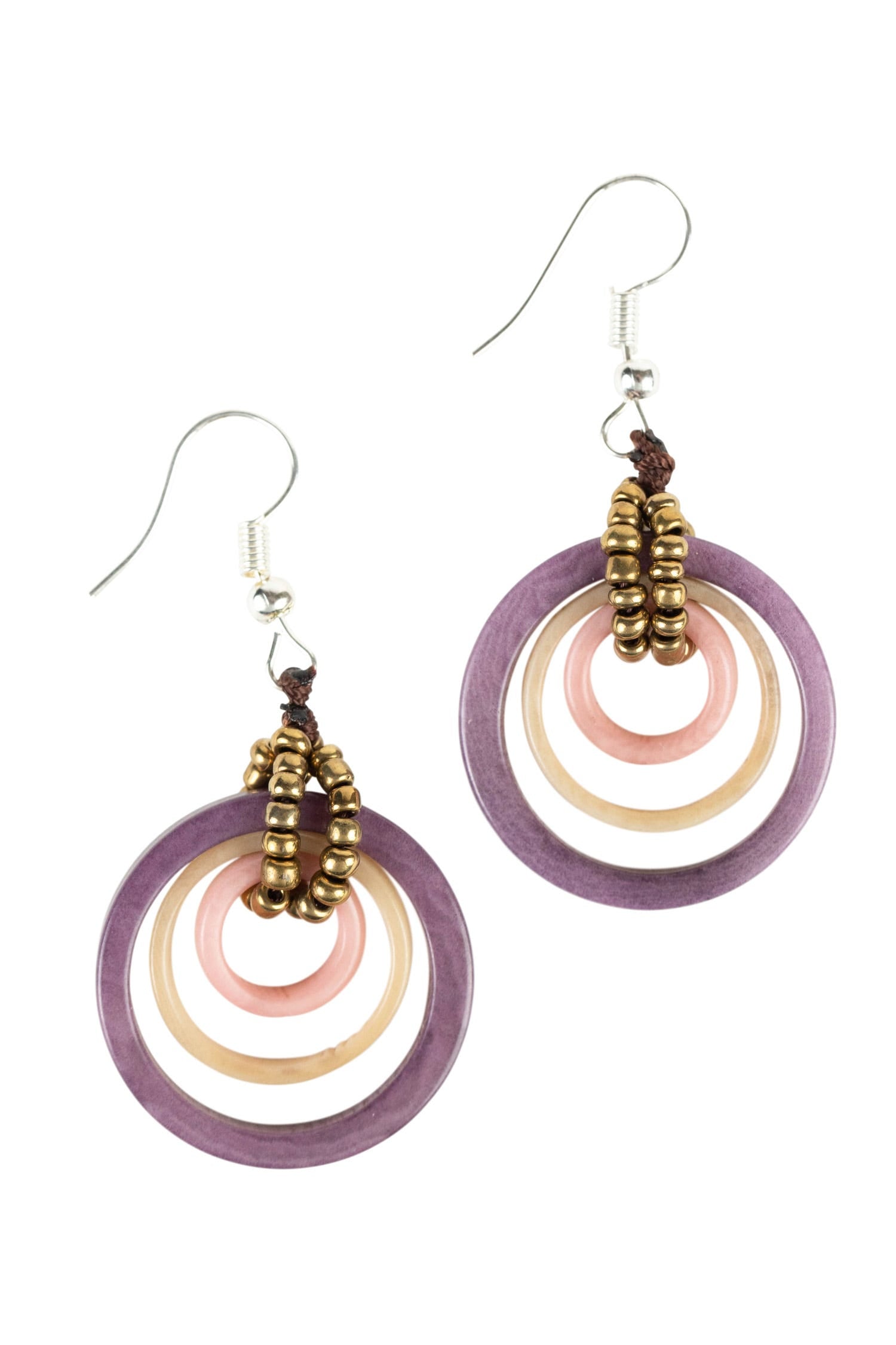 Front view of Supernova Tagua earrings showcasing vibrant eco-friendly jewelry