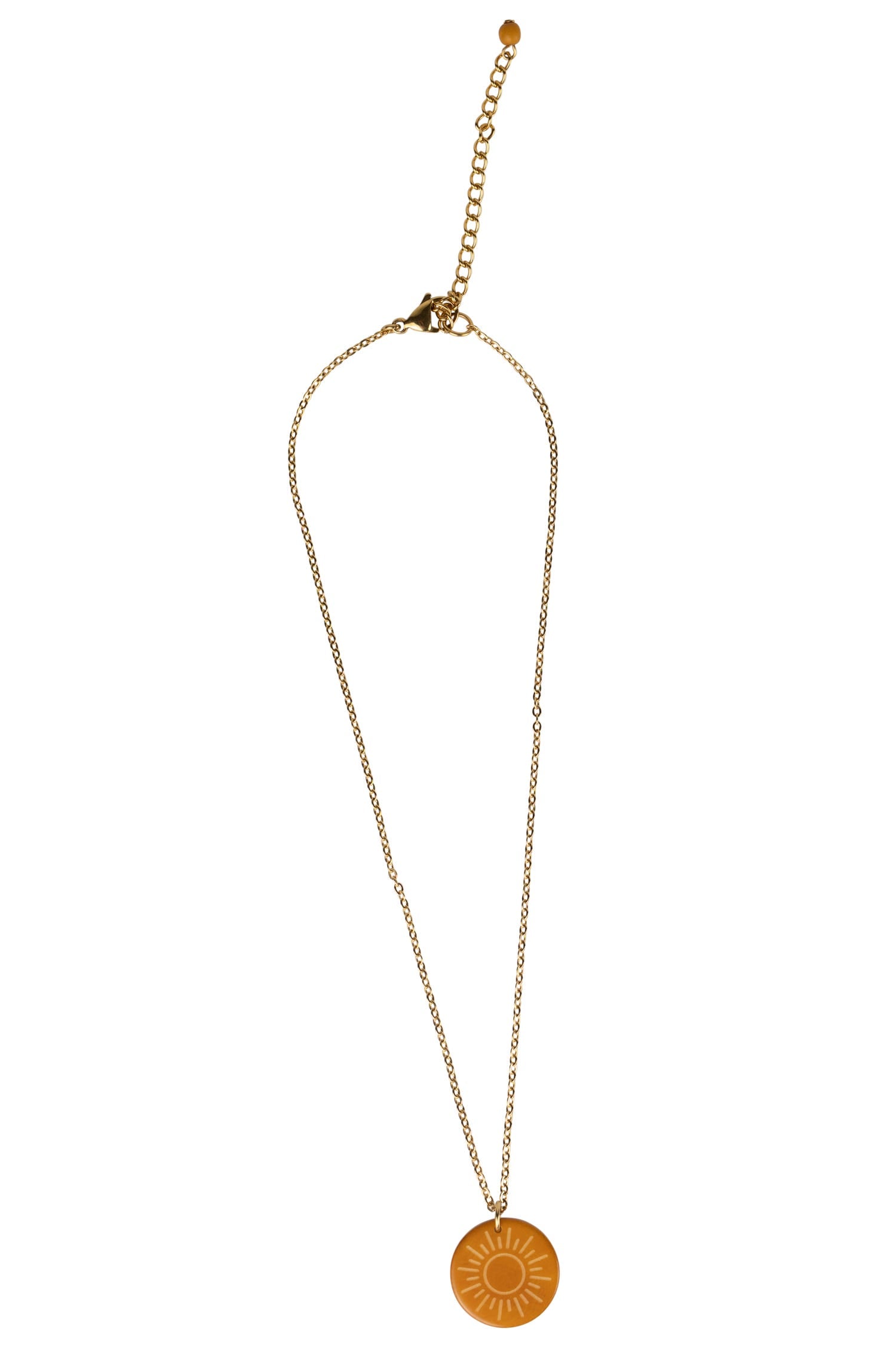 Close-up of vegetable ivory pendant showing delicate carving and artisan detail – eco-friendly jewelry