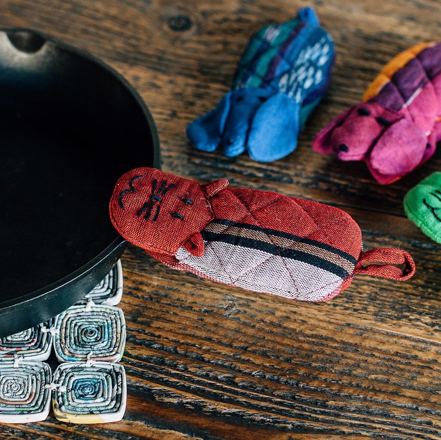 Colorful kitten pan handle cover showcasing vibrant design