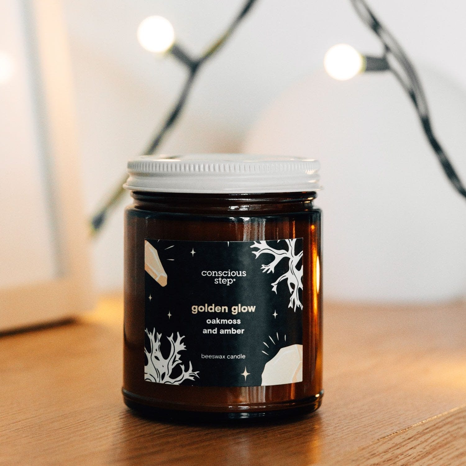 Golden Serenity Aromatherapy Candle in a cozy living room setting, perfect for relaxation.